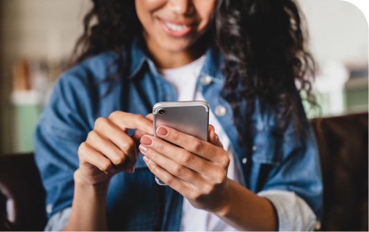 Young woman on phone using social media